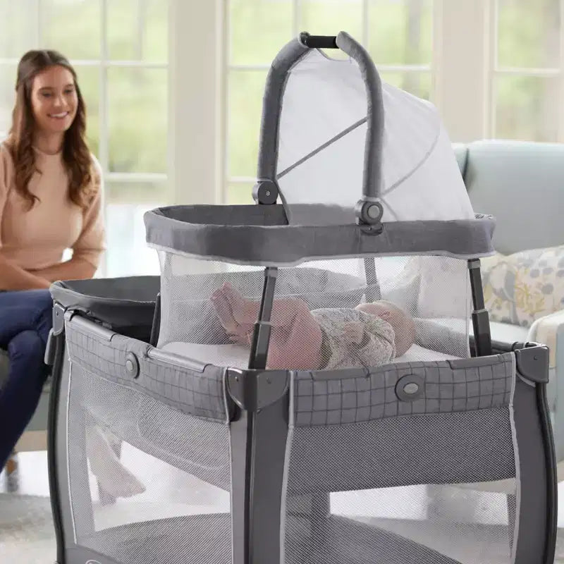 Travel Bassinet Playard with Changing Table & Carry Bag, 32 lb Capacity, Ages 0-2