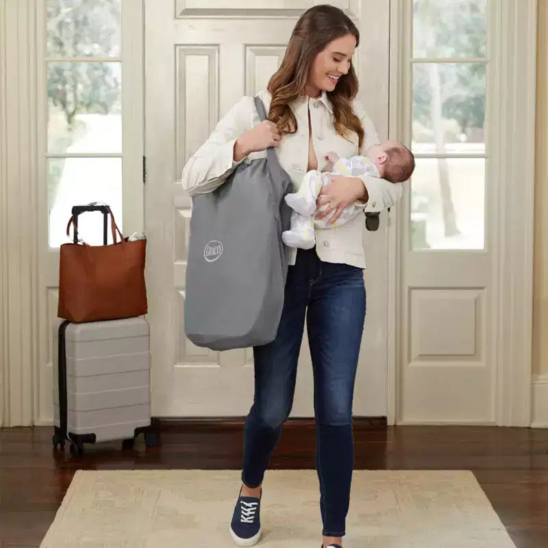 Travel Bassinet Playard with Changing Table & Carry Bag, 32 lb Capacity, Ages 0-2